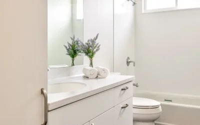Multigenerational addition has two bathrooms to reduce grooming backlog.